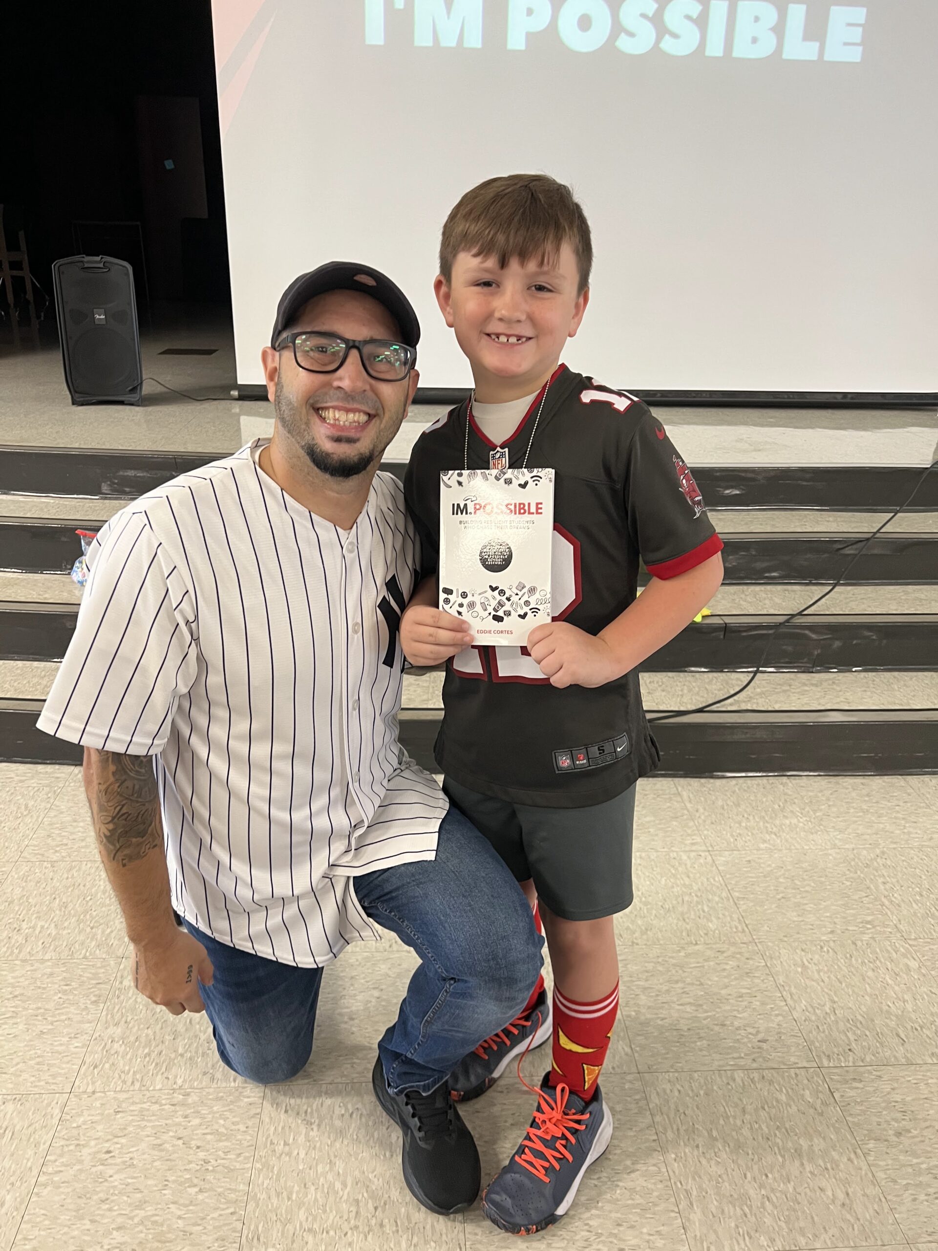 Author and Motivational Youth Speaker Eddie Cortes with Elementary Student at Bailey Elementary School