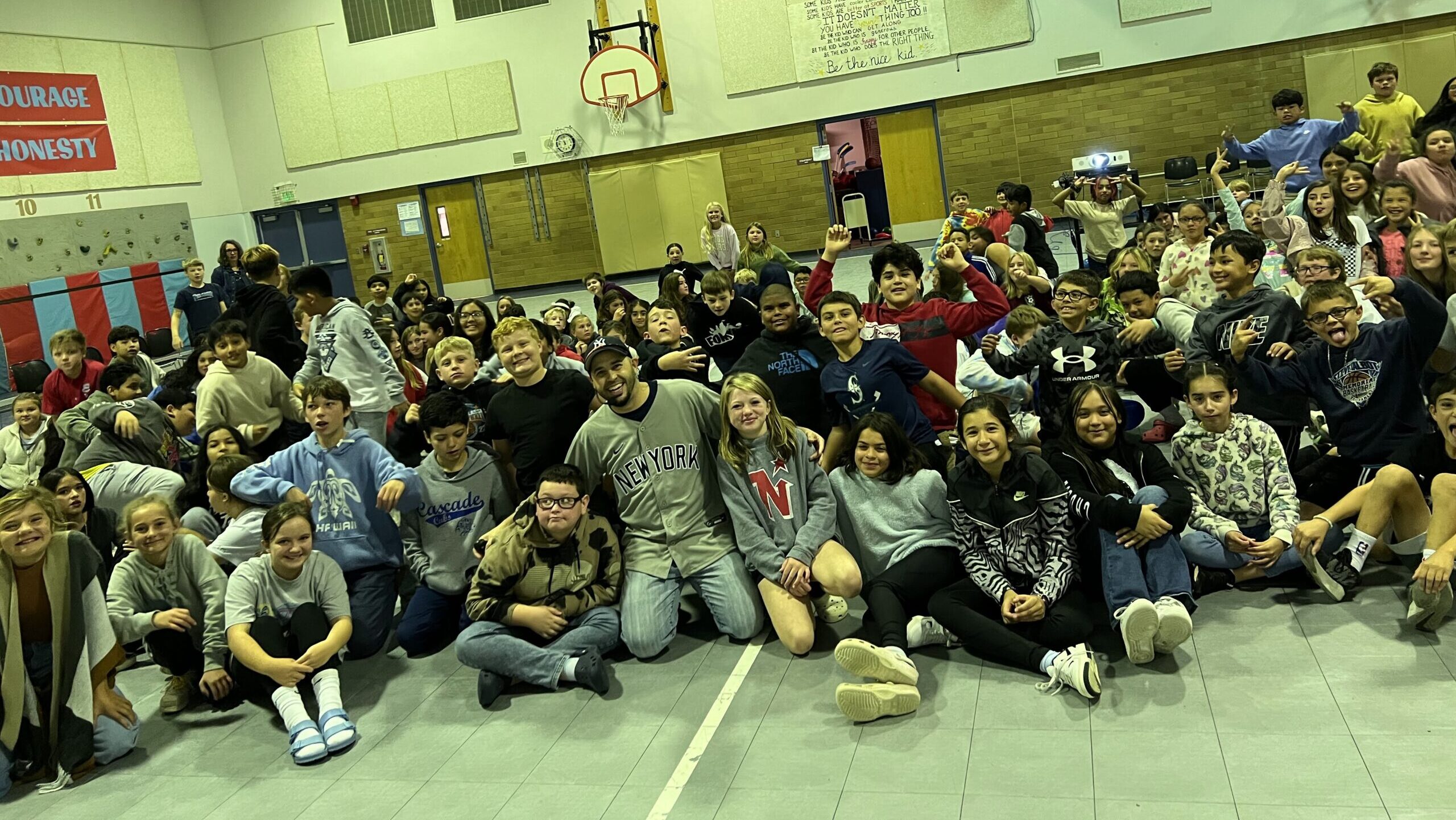 Motivational Youth Speaker Eddie Cortes with students at the school assembly program at Cascade Elementary School
