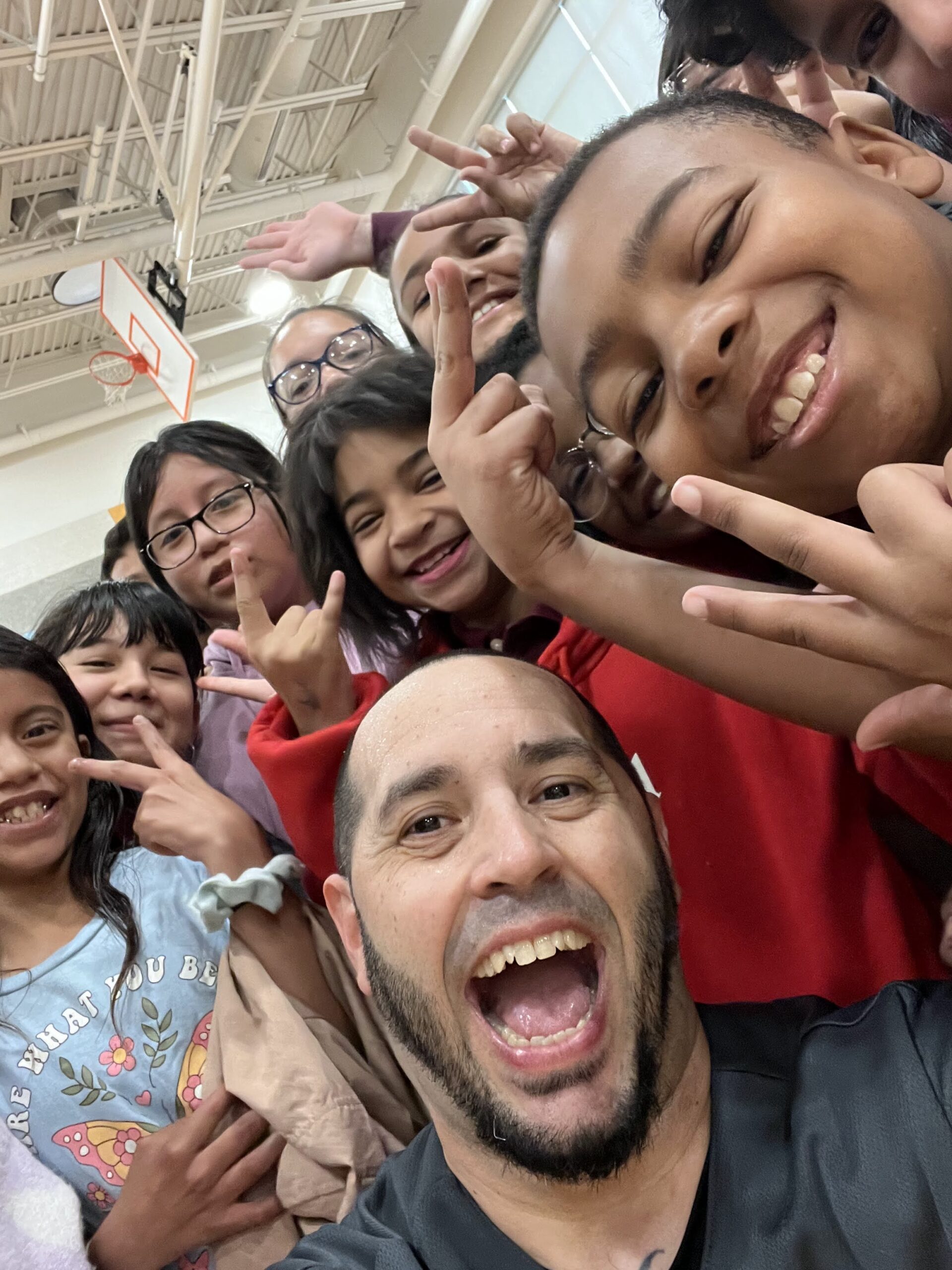 Students of Graceland Park O'Donnell Heights Elementary Middle School with Eddie Cortes