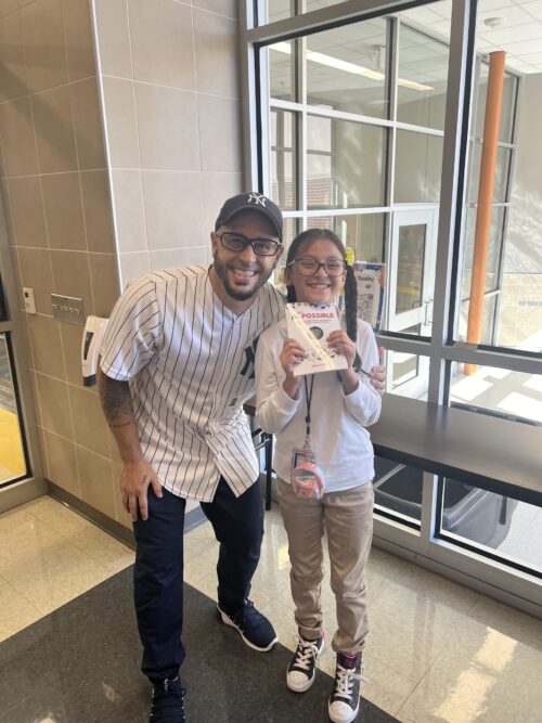 Students of Graceland Park O'Donnell Heights Elementary Middle School with Eddie Cortes